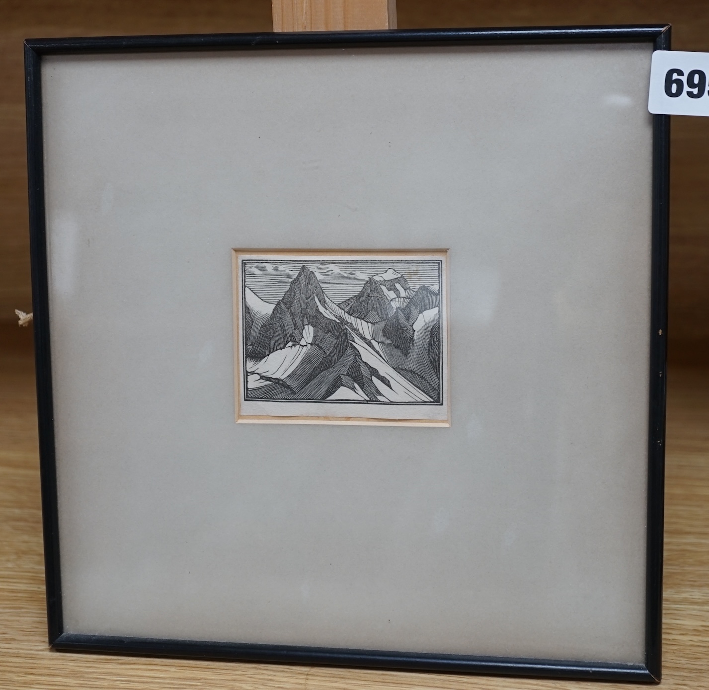 After Gwen Raverat (1885-1957), wood engraving, Mountain landscape, unsigned, inscribed 'by Gwen Raverat from Charles Tennyson, November 1959' and W. Heffer and Sons Gallery label verso, 6 x 8cm. Condition - fair, some d